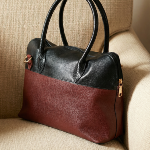 Two-tone genuine leather handbag for women in black and chocolate brown with top handles